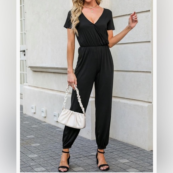 New Women’s Black Casual
pantsuit jumpsuit
Elastic waist
Super soft cotton - Picture 2 of 10